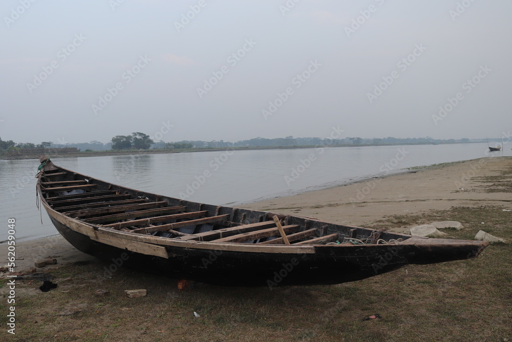 A boat on the river bank in Bangladesh A boat on the river bank in Bangladesh