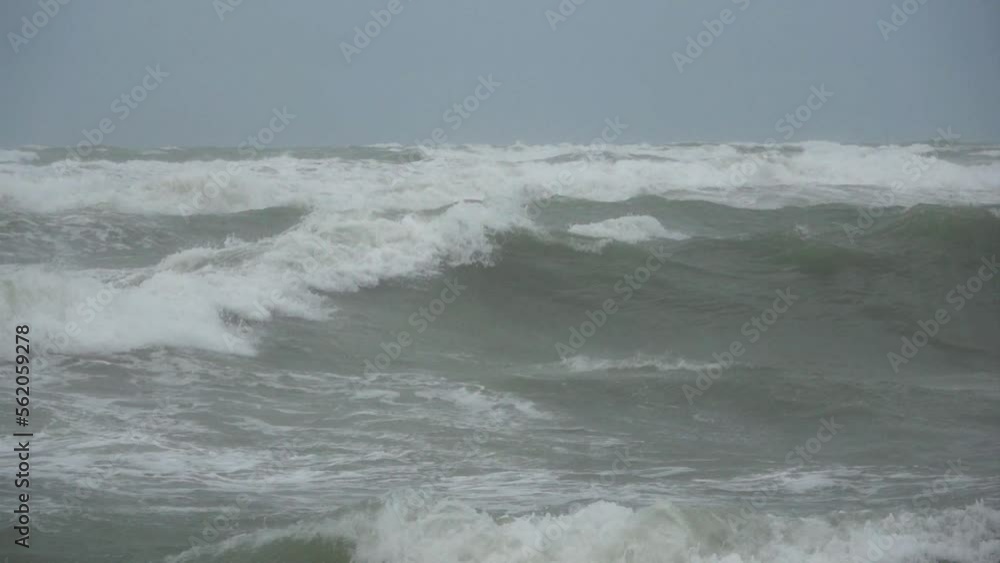 Stormy sea with waves crashing on artificial reefs, winter mediterranean sea. Slow motion Stormy sea with waves crashing on artificial reefs, winter mediterranean sea. Slow motion