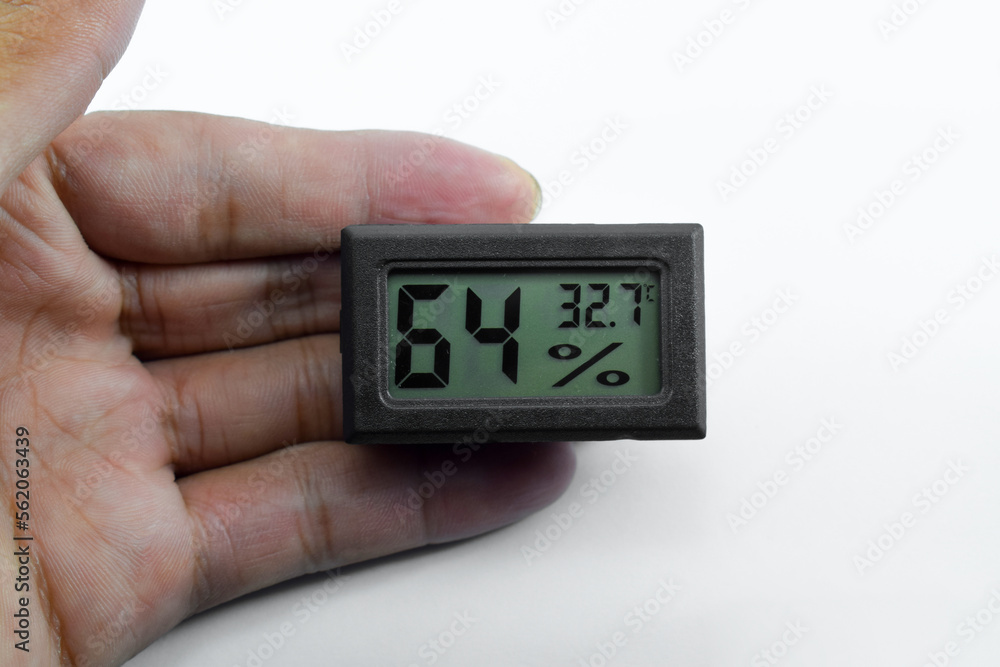 Analog Thermometer Hygrometer is used to measure room temperature and humidity. Hygrometer isolated on white background - obrazy, fototapety, plakaty 