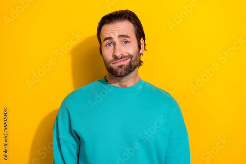 Portrait photo of unhappy dissatisfied guy student worker pouted lips grimace forgot deadline last exam isolated on yellow color background