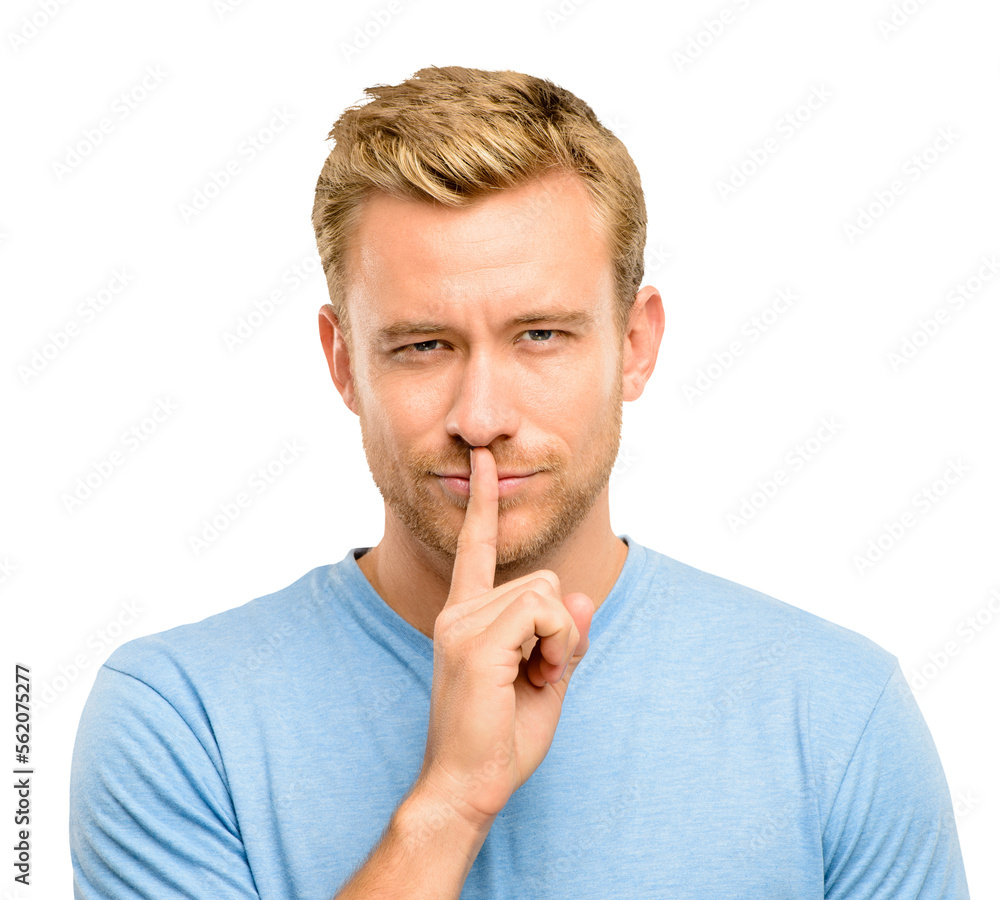A handsome young man standing alone in the studio with his finger on his lips isolated on a PNG background. A handsome young man standing alone in the studio with his finger on his lips isolated on a PNG background.