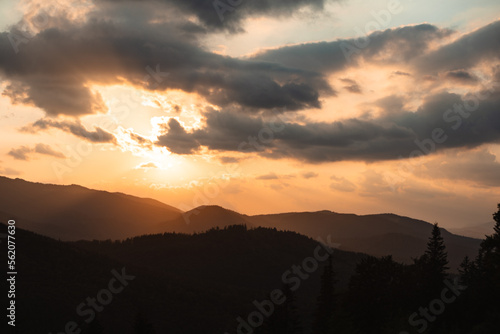 colorful sunset on top of ukrainian mountain