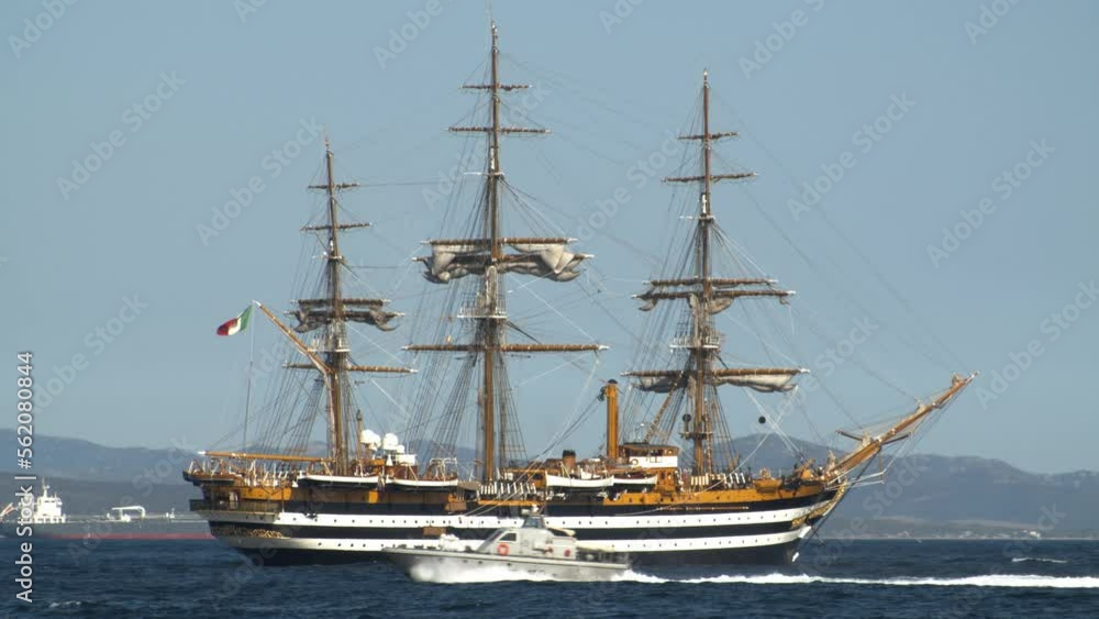 Telephoto shot of Italian Amerigo Vespucci Tallship, military vehicle passing by Telephoto shot of Italian Amerigo Vespucci Tallship, military vehicle passing by