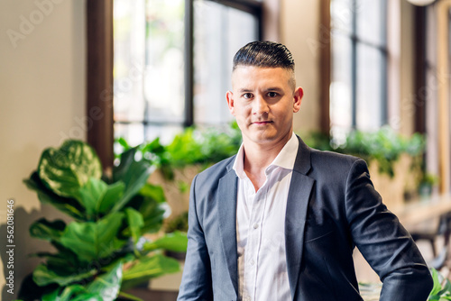 Wallpaper Mural Portrait of confident handsome businessman smiling smart looking at camara.Young creative coworkers business people working and planning at office Torontodigital.ca