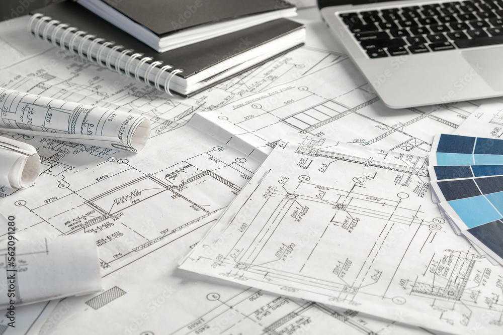 Architects concept, engineer architect designer freelance work on start-up project drawing, construction plan. architect design working drawing sketch plans blueprints and making construction model Architects concept, engineer architect designer freelance work on start-up project drawing, construction plan. architect design working drawing sketch plans blueprints and making construction model