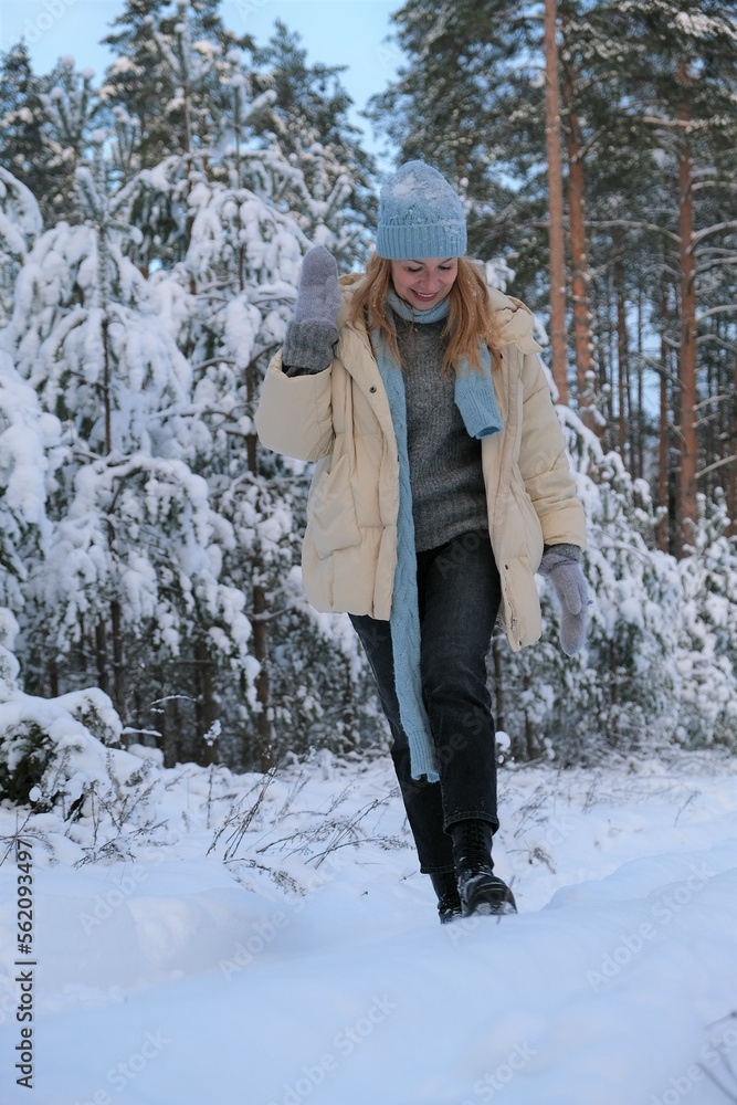 women in winter forest