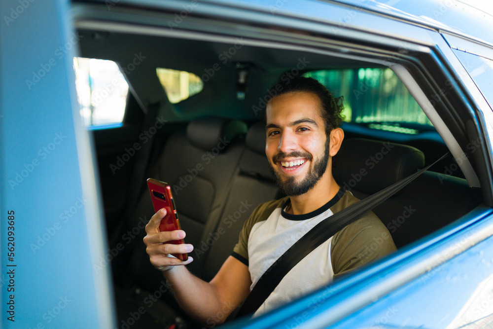 Excited man passenger taking a ride share trip Excited man passenger taking a ride share trip