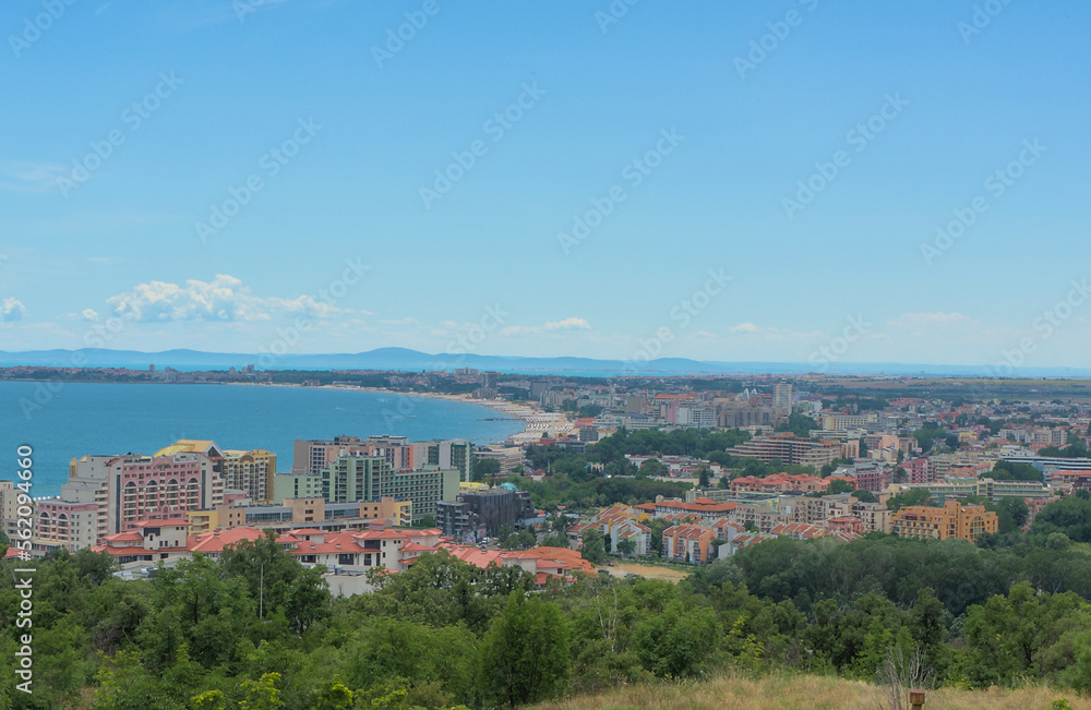 Landscape of a resort with hotels and parks on the coast of the sea with sandy beaches on a clear sunny day