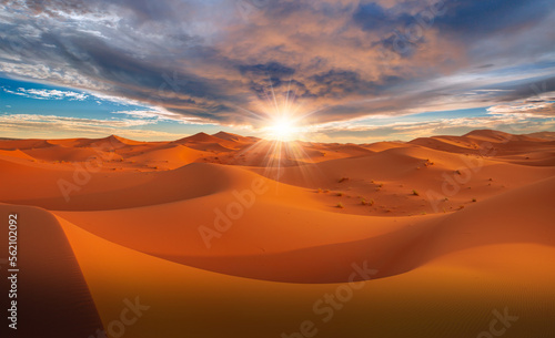 Beautiful sand dunes in the Sahara desert with amazing sunrise sky - Sahara, Morocco