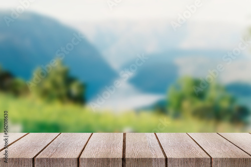Wooden desktop with blurred background