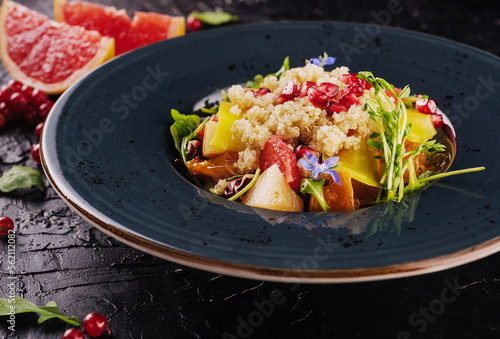 salad couscous with grapefruit and pomegranate seeds