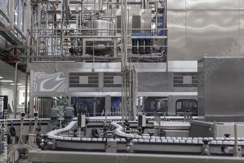 Bottling line in a milk factory.
