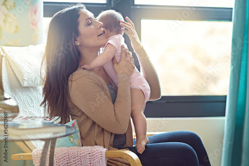 Tablou pe pânză Mother, bonding or hugging baby girl in house living room or family home nursery in support trust, love or security