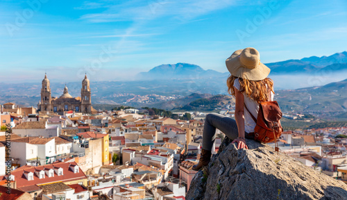 Woman tourist at Jaen, l ooking at panoramic view of the cathedral- Spain