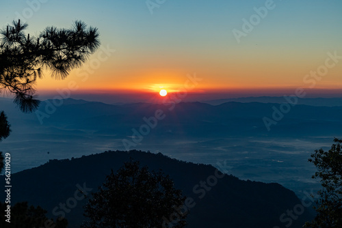 View of  Beautiful landscape in the mountains at sunrise in the morning. Beautiful sky background and the foggy hills covered. Nature tourism  healthy lifestyle concept and beautiful nature.