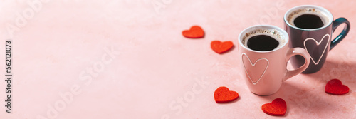Two coffee cups with heart in pink and black colors for Valentines Day