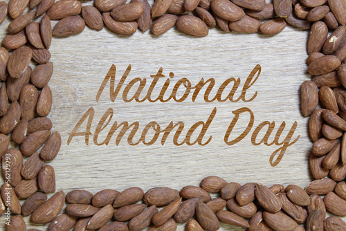 Healthy food concept idea. National almond day. Frame made with nut. 