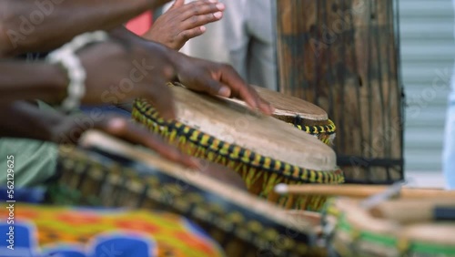 Close-up of group of musicians playing african drums in Alexandra Township in South Africa photo