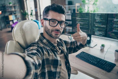 Leinwand Poster Photo of professional smart hacker guy sitting chair take selfie hand finger sho