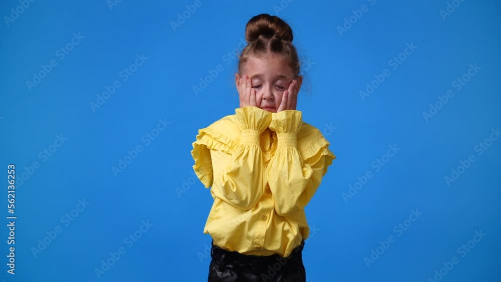 4k slow motion video of small girl touching her head. 4k slow motion video of small girl touching her head.