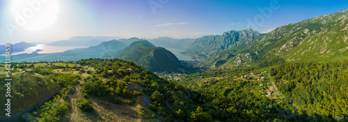 Panorama of the Bay of Kotor with beaches and hotels and the Adriatic Sea against the backdrop of sunny sky
