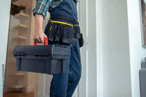 Repair technician arriving at a client house