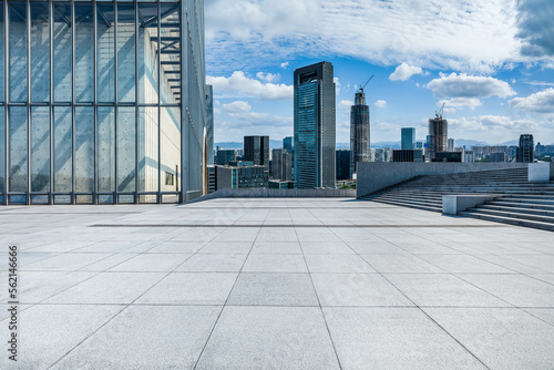 Empty square floor and city skyline with modern buildings in Ningbo, Zhejiang Province, China.