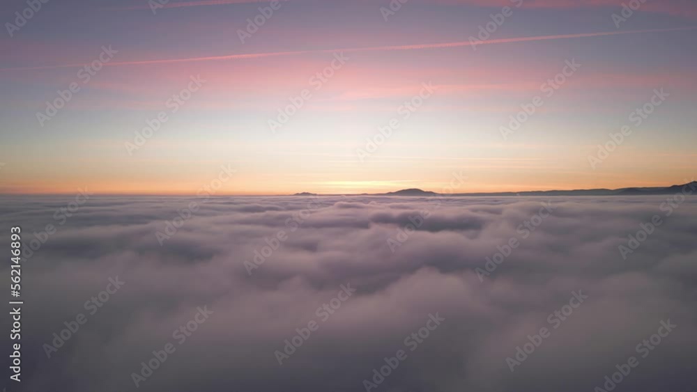 Amazing view over clouds at sunset Amazing view over clouds at sunset