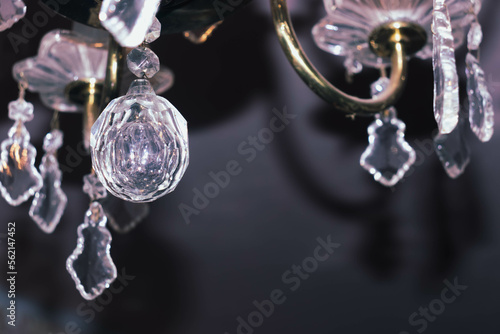 Glass pendants in the form of balls. handelier with crystal pendants. rystal faceted ball photo