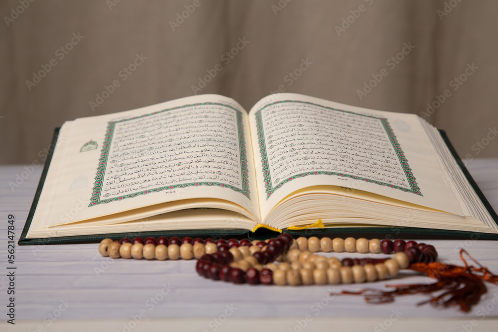 Fototapeta premium Concept: open Quran book local language holy prayers for god,Coran - holy book of Muslims religion, Friday month of 1444 Puasa Ramadan religion Islamic worshiping faith