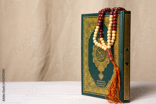 Concept: open Quran book  local language holy prayers for god,Coran - holy book of Muslims religion,
Friday month of 1444 Puasa Ramadan religion Islamic worshiping faith photo