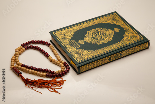 Concept: open Quran book local language holy prayers for god,Coran - holy book of Muslims religion, Friday month of 1444 Puasa Ramadan religion Islamic worshiping faith