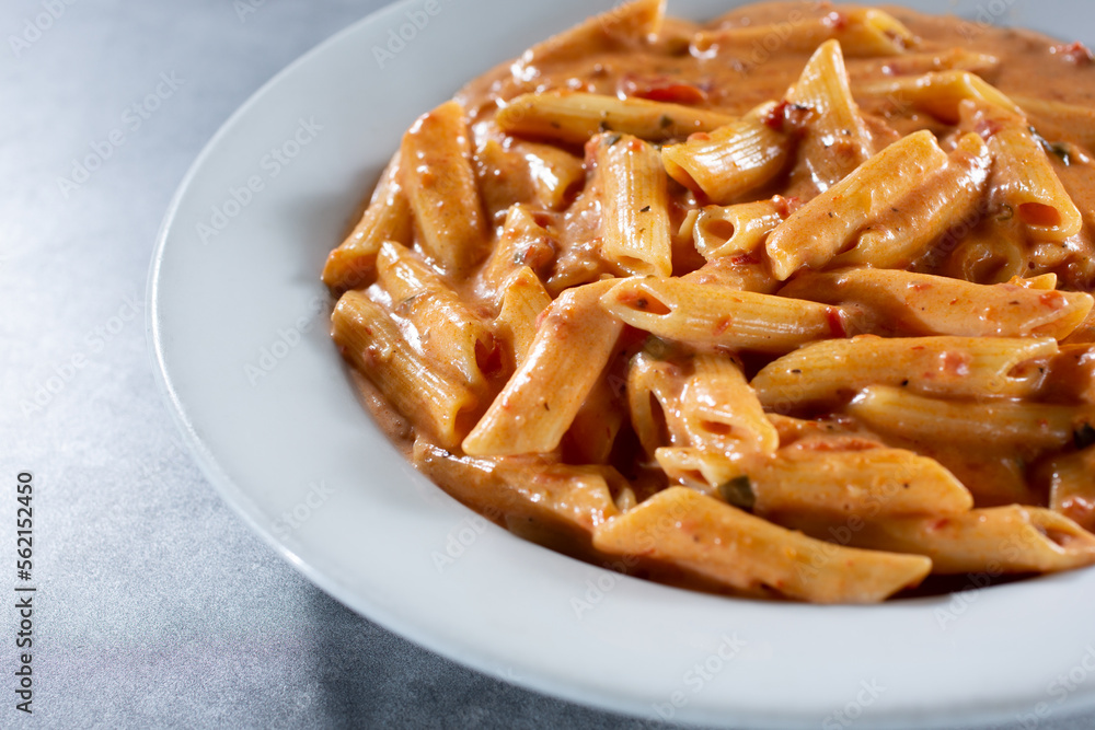 A view of a plate of penne Arrabbiata. A view of a plate of penne Arrabbiata.