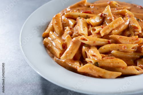 A view of a plate of penne Arrabbiata.