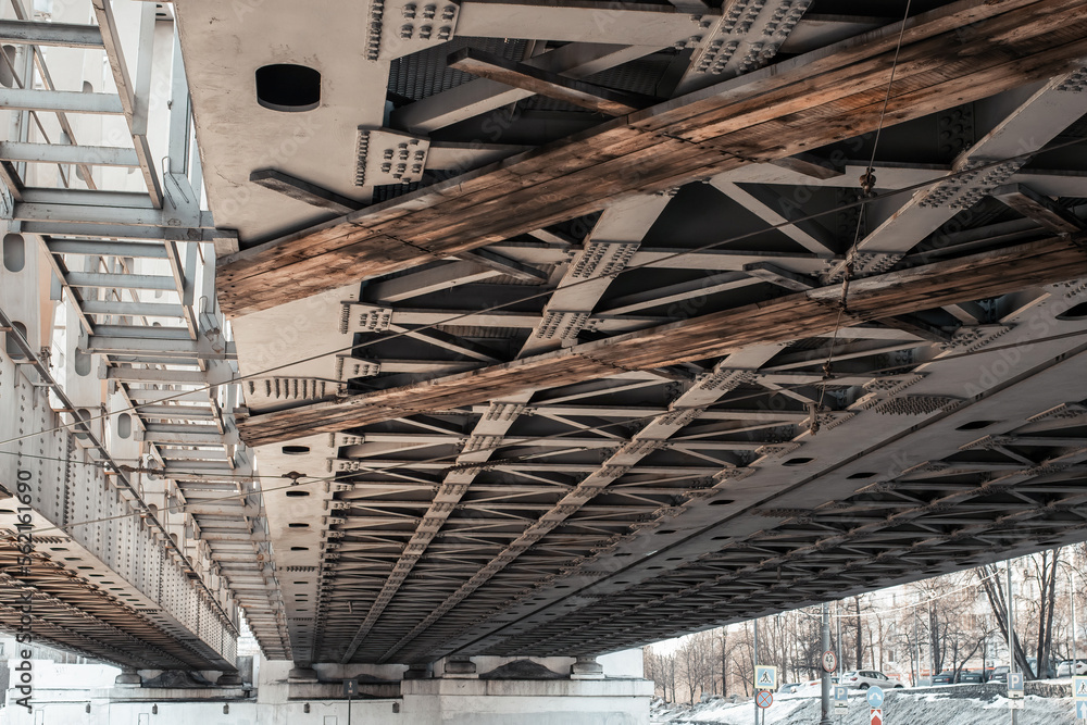 metal construction under bridge steel beam with iron screw and rivets metal construction under bridge steel beam with iron screw and rivets