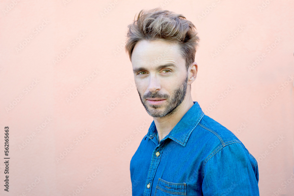 Portrait of handsome hipster guy looking at camera with serious face. Portrait of handsome hipster guy looking at camera with serious face.