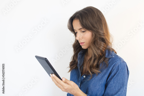 E-book Woman Reading a book on an E-reader