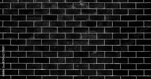 black brick wall background texture close up