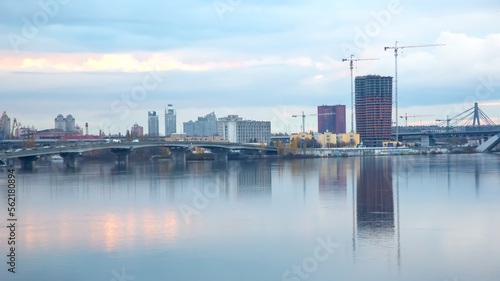 bridge across a large river in a modern city. industrial city infrastructure © photosaint