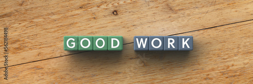Billede på lærred 3D Cubes with the words good work on a wooden background
