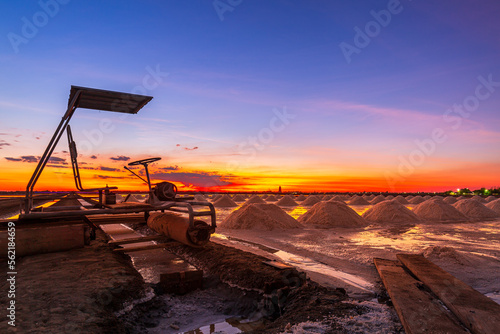 Scenery, salt farm and sky in the evening of Thailand,front view sea salt pile made for tourists. Come to visit and see the ancient salt-making of local people during summer year. 