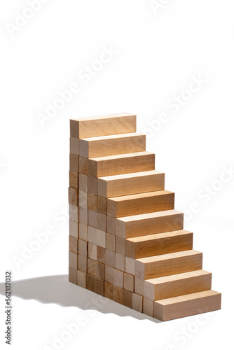 Geometric figure made of wooden bars on a white background