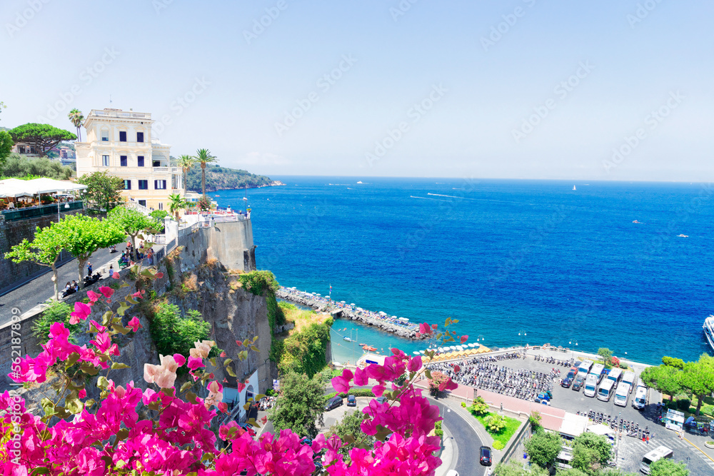 embankment of Sorrento at summer day with flowers, southern Italy