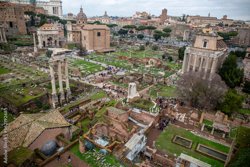 Aerial view over Rome showing the Roman Forum, the buildings on Palatine Hill and the city Aerial view over Rome showing the Roman Forum, the buildings on Palatine Hill and the city