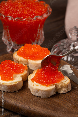 Baguette sandwiches with butter and red caviar