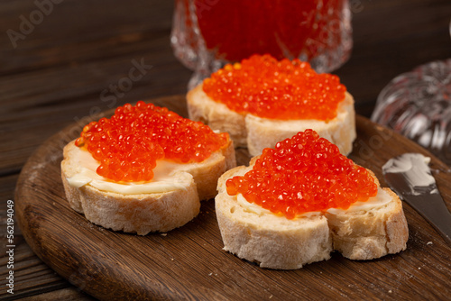 Baguette sandwiches with butter and red caviar