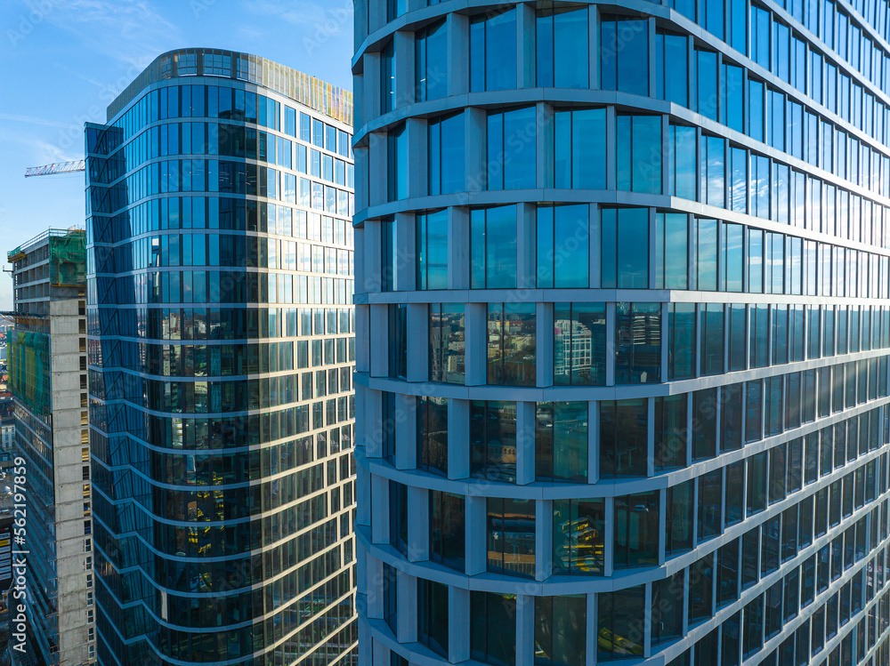 Drone view of skyscrapers over the city. Concept of a modern city with skyscrapers. Aerial view of tall and modern buildings. Drone view of skyscrapers over the city. Concept of a modern city with skyscrapers. Aerial view of tall and modern buildings.