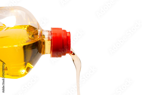 A bottle of sunflower oil isoalted on a white background.