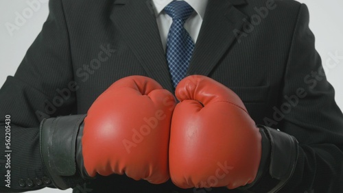 Detail of businessman  hands wearing box gloves with suit and tie © MEDIAIMAG