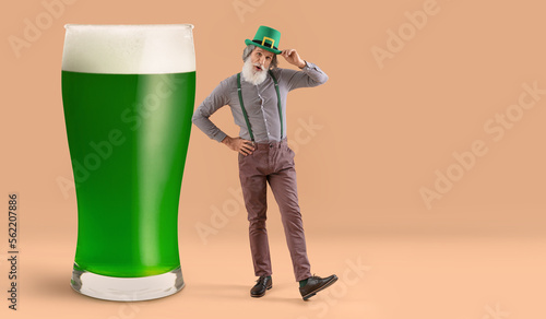 Senior man and big glass of...